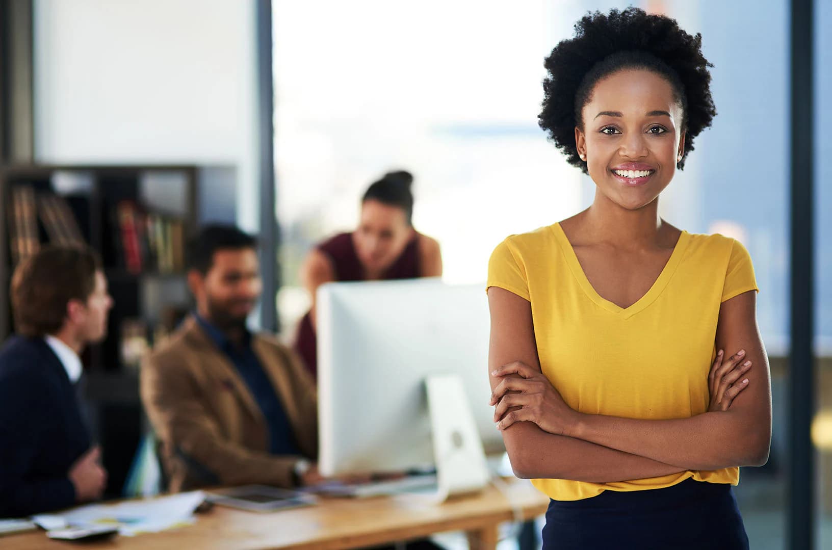 South African compliance professional in a modern office